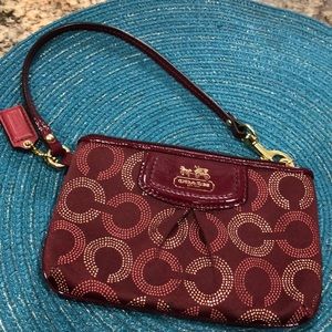 Cute crimson and gold  coach wristlet